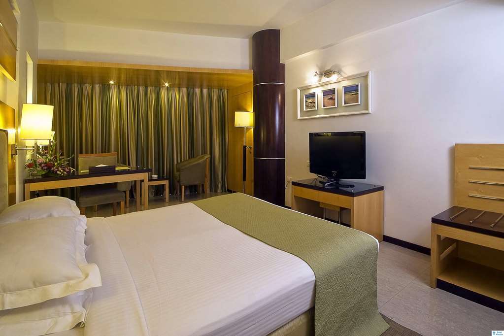 Hotel Peninsula Grand Bombay Habitación foto