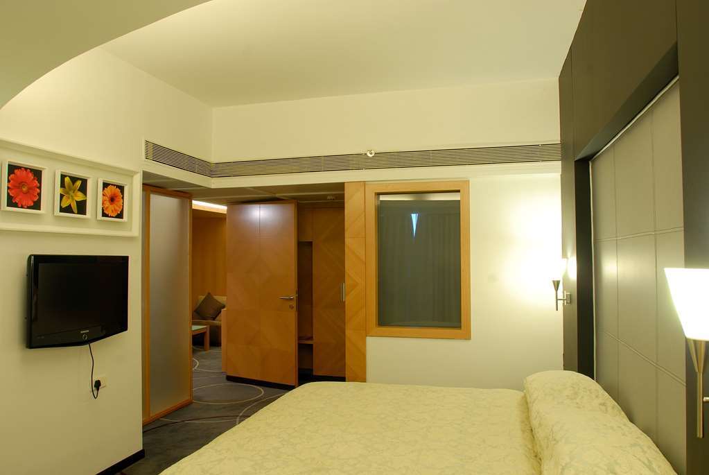 Hotel Peninsula Grand Bombay Habitación foto